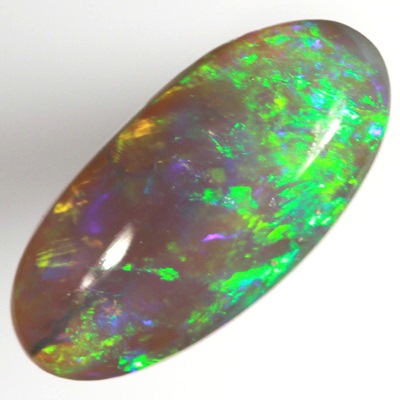 SOLID BLACK CRYSTAL OPAL Rolling flashes of green over purple fire